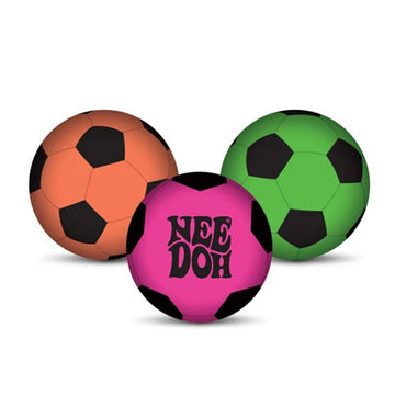 A cube box with the text 'Nee Doh Hot Shots Soccer' on the front with images of coloured soccer balls on the sides.