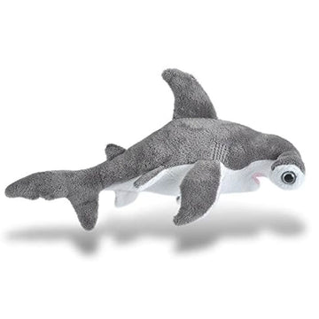 A hammerhead shark soft toy in grey with a white belly.