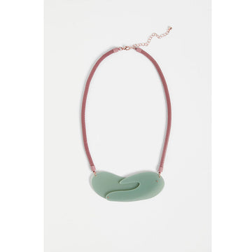 An image of a pink necklace with a green pendant.