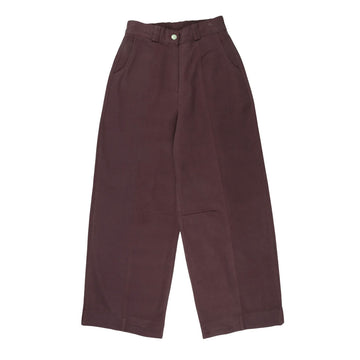 A pair of burgundy coloured pants.