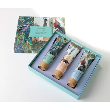 An open box with three tubes of hand cream inside each illustrated with a different Australian bird. The box lid matches.