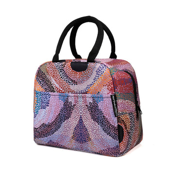 An insulated lunch bag illustrated with artwork by Marianne Burton in shades of purple with black handles.