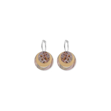 Pair of circle shaped hoop earrings on a white background.