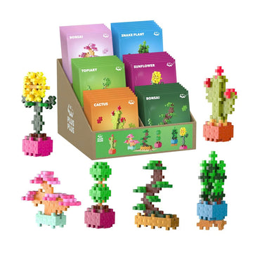 Six packets of plant building blocks surrounded by completed plants.