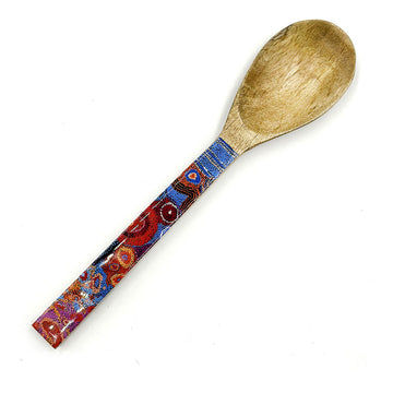 A wooden serving spoon printed with artwork by Andrea Adamson on the front.