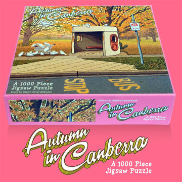 Jigsaw puzzle box titled 'Autumn in Canberra' on a pink background.