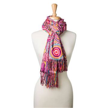 A mannequin wearing a pink scarf printed with artwork by Jeanie Ross.