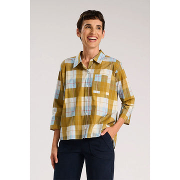 Plaid shirt in yellow and blue on a white background.