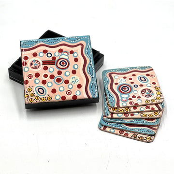 A set of six coasters with a matching box printed with artwork by Andrea Adamson.