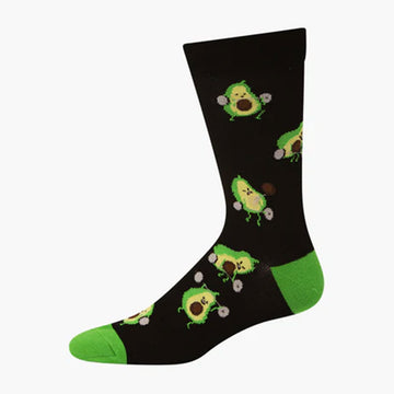 A black sock with a green heel and toe and illustrated with avocado lifting weights.