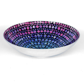 A stainless steel bowl printed with artwork by Olivia Wilson on the inside.