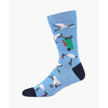Blue sock with bird pattern on a white background.