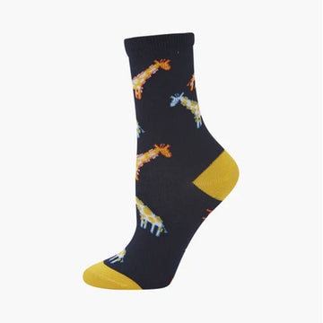 A kids navy blue sock with a yellow heel and toe and illustrated with coloured giraffes.