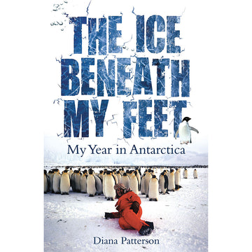 'The Ice Beneath My Feet' book cover featuring a photo of a person laying on the ice with penguins in the background.