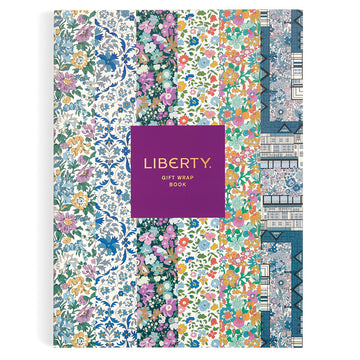 Front cover of a book titled 'Liberty Gift Wrap Book' with columns of six different liberty floral prints.