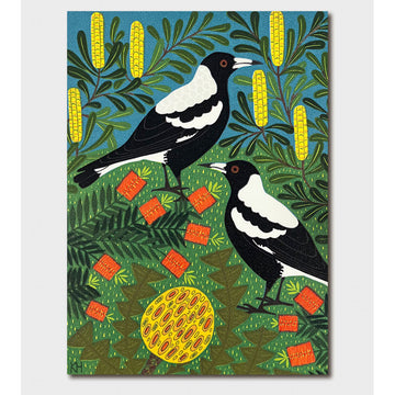 A greeting card illustrated with two magpies on a background with green foliage and yellow flowers.