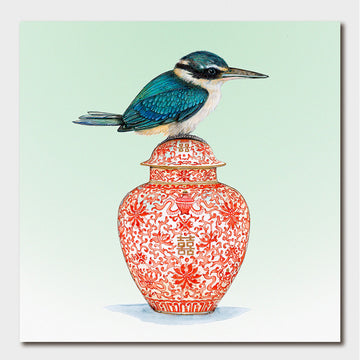 A square greeting card with an illustration of a bird standing on a red patterned vase.