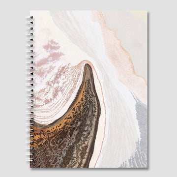 Notebook with a spiral binding and a cover featuring a natural landscape design on a gray background.