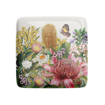 Square magnet with a floral design on a white background.