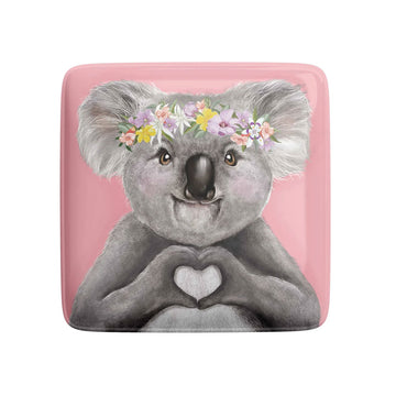 Square pink magnet with an illustration of a koala making a heart shape with her paws.