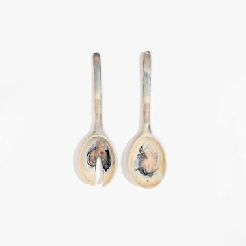 A pair of resin salad servers.
