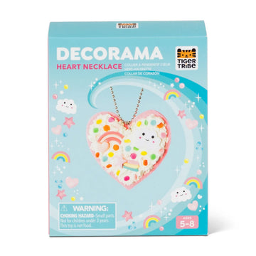 A box titled 'Decorama Heart Necklace' with an image of a heat shaped necklace decorated with rainbows, sprinkles and a cloud with a face.