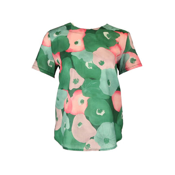 A women's short sleeve top with a pink and green floral print.