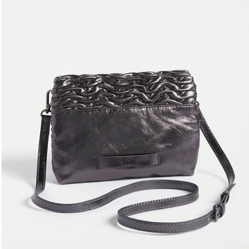 Front view of a rectangle cross body bag with an embossed wave pattern across the bag.