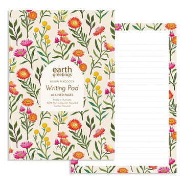 Writing pad with floral design and 'earth greetings' text on a white background.