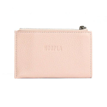 Front view of a light pink card holder with a zip along the top.