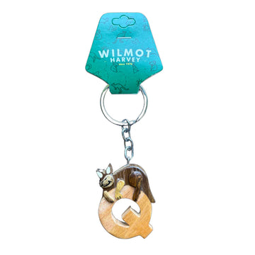 Keychain with a wooden letter 'Q' and kangaroo charm, attached to a Wilmot Harvey branded tag.