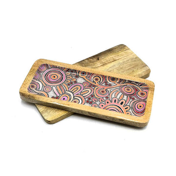 A rectangular wooden tray printed with artwork on the inside resting on the back of another tray.
