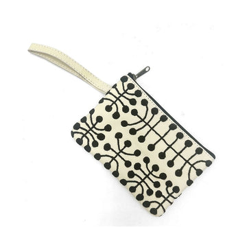 A white leather coin purse embroidered with black motifs.