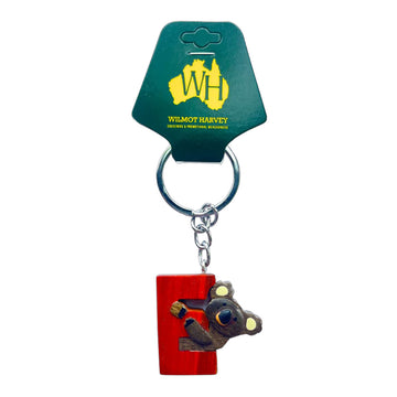 Keychain with koala design and red 'E', attached to a Wilmot Harvey branded card.