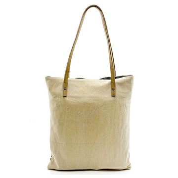 Front view of a tote bag printed with black motifs on a natural coloured base.