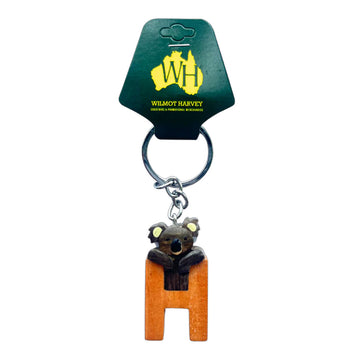Keychain with koala design on a wooden letter 'H' and Wilmot Harvey packaging.