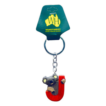 Keychain with a koala design on a red 'J', attached to a Wilmot Harvey packaging.