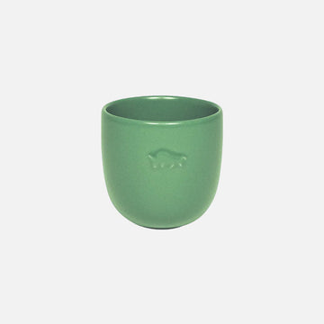 Green ceramic cup with a logo on a white background.