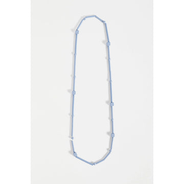 A light blue necklace made up of long and cube shaped beads.
