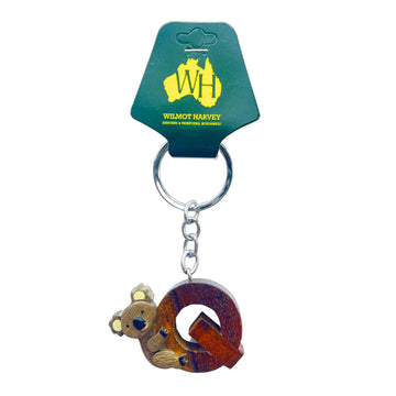 Koala-shaped keychain on a green Wilmot Harvey card against a white background.