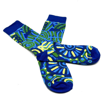 A pair of blue socks overlapping each other and printed with artwork by Cedric Varcoe.
