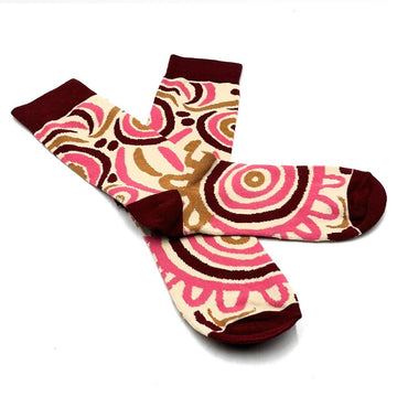 A pair of socks printed with artwork by Bianca Gardiner-Dodd overlapping each other.