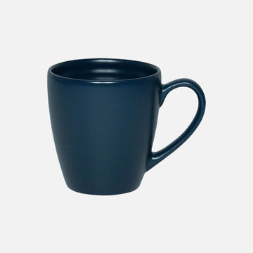 A dark blue ceramic mug on a white background.