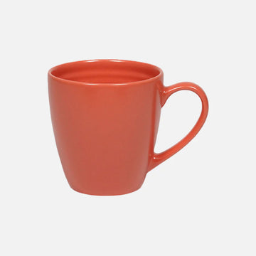 Orange mug on a white background.