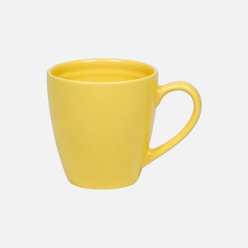 Yellow mug on a light gray background.