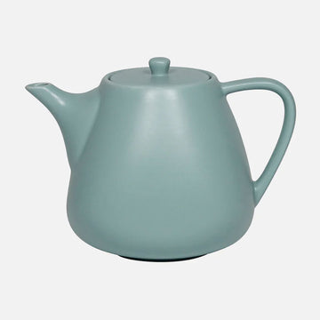 Light blue ceramic teapot on a white background.