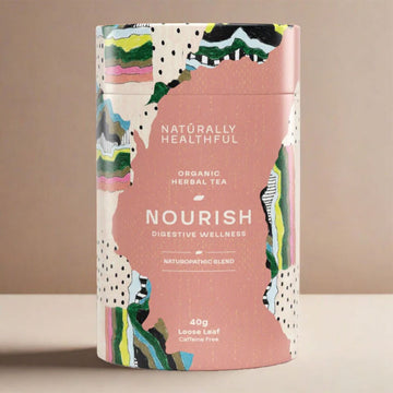 Tea packaging with colorful design and text on a beige background.
