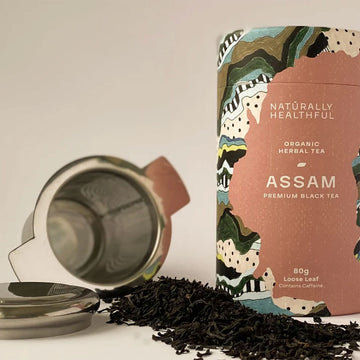 Tea packaging with colorful design and text on a beige background.