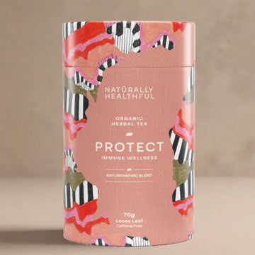 Tea canister with colorful design and text on a beige background.