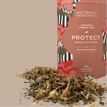 Tea canister with colorful design and text on a beige background.